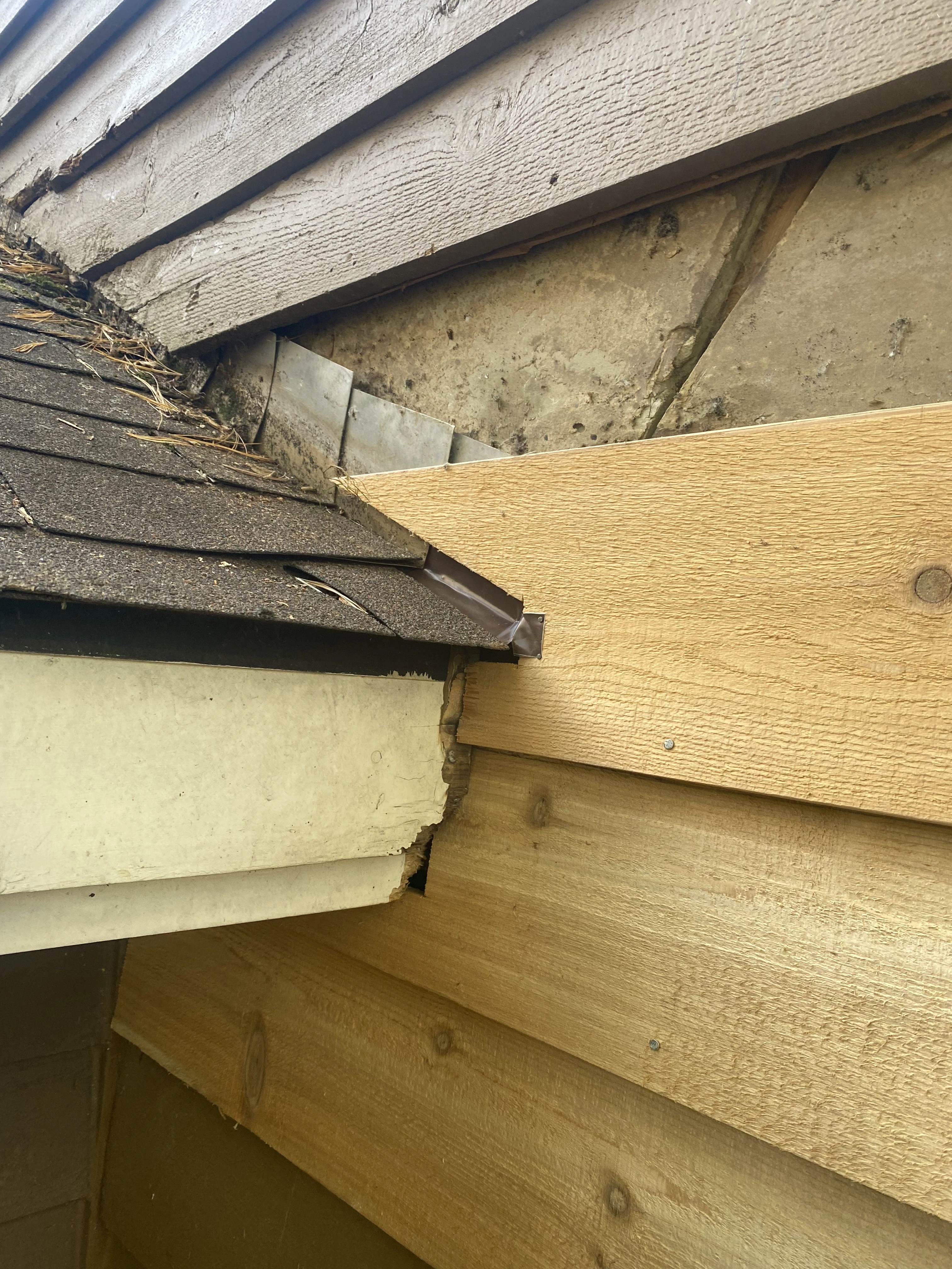 Cedar siding repair work in progress