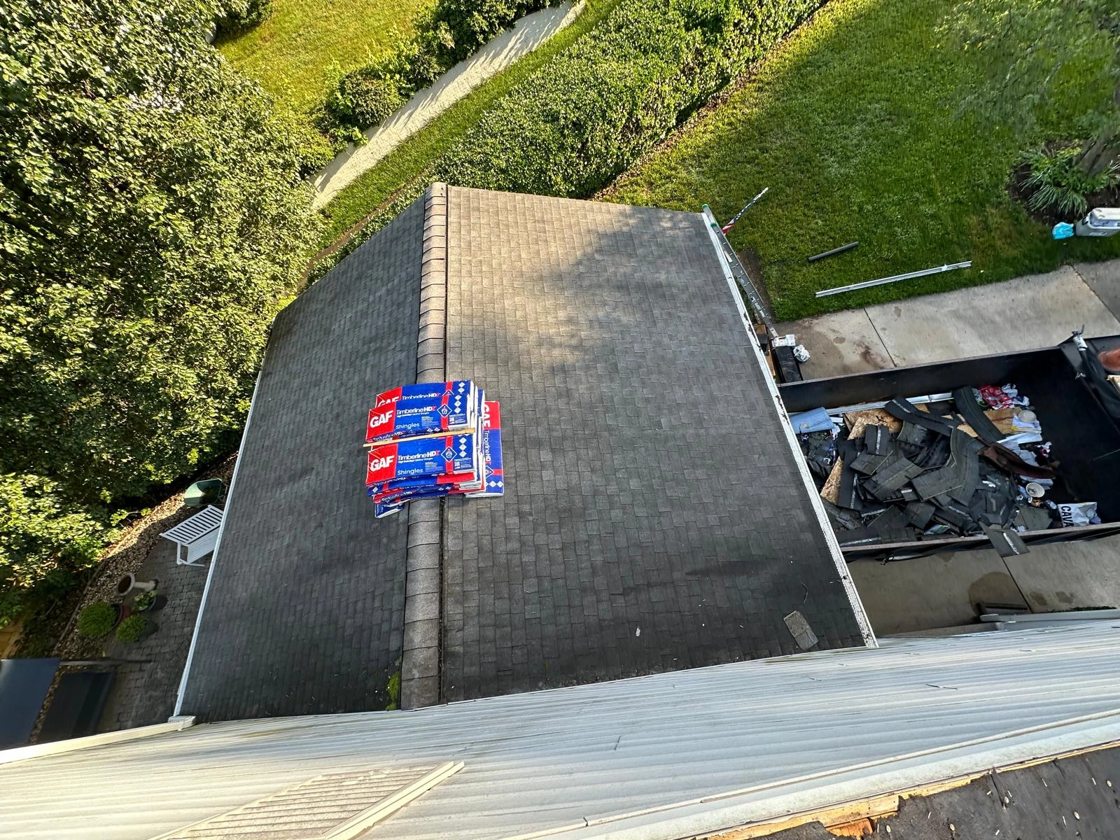 Wind damaged roof before repair
