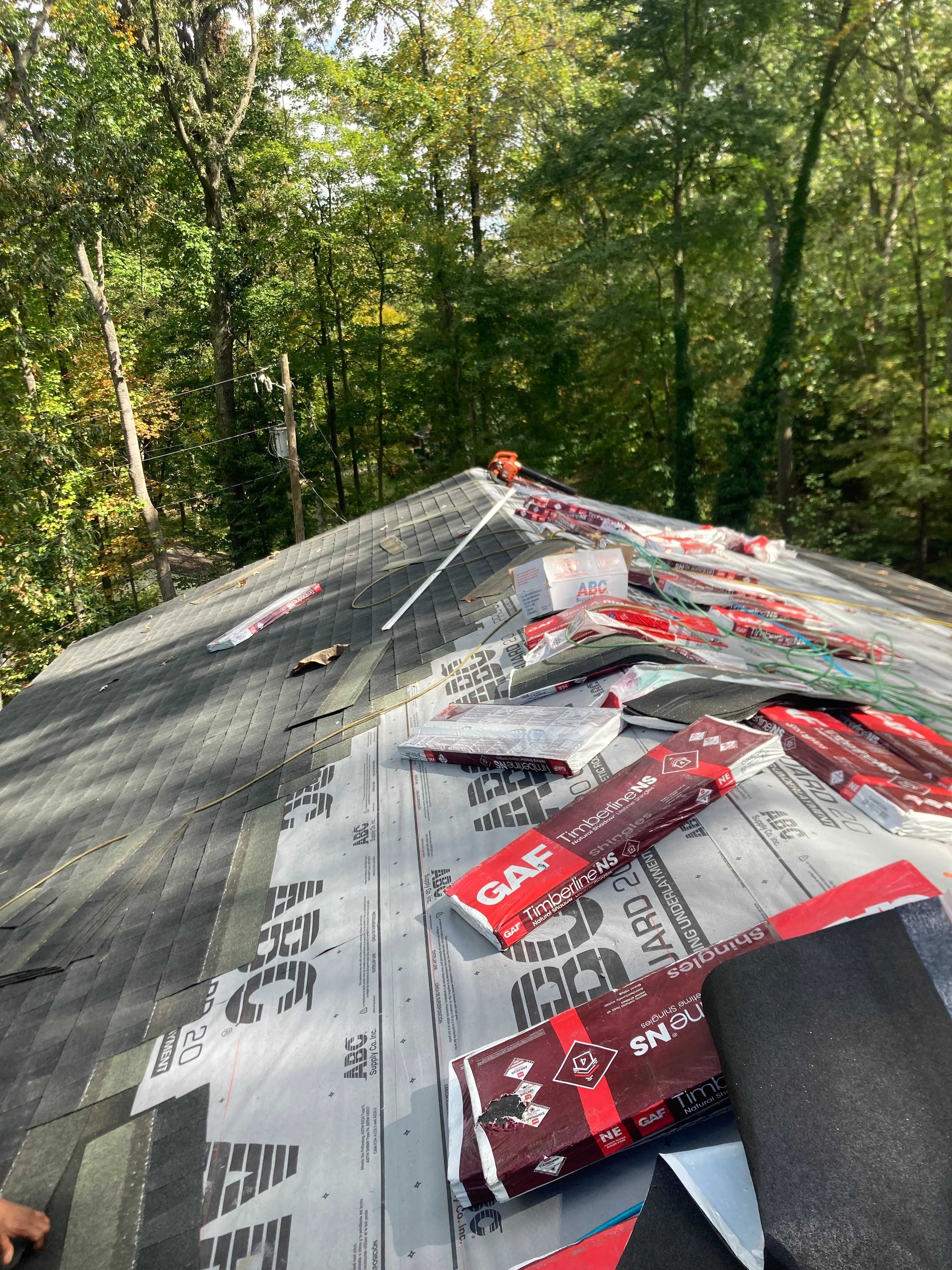 Storm damaged roof before replacement