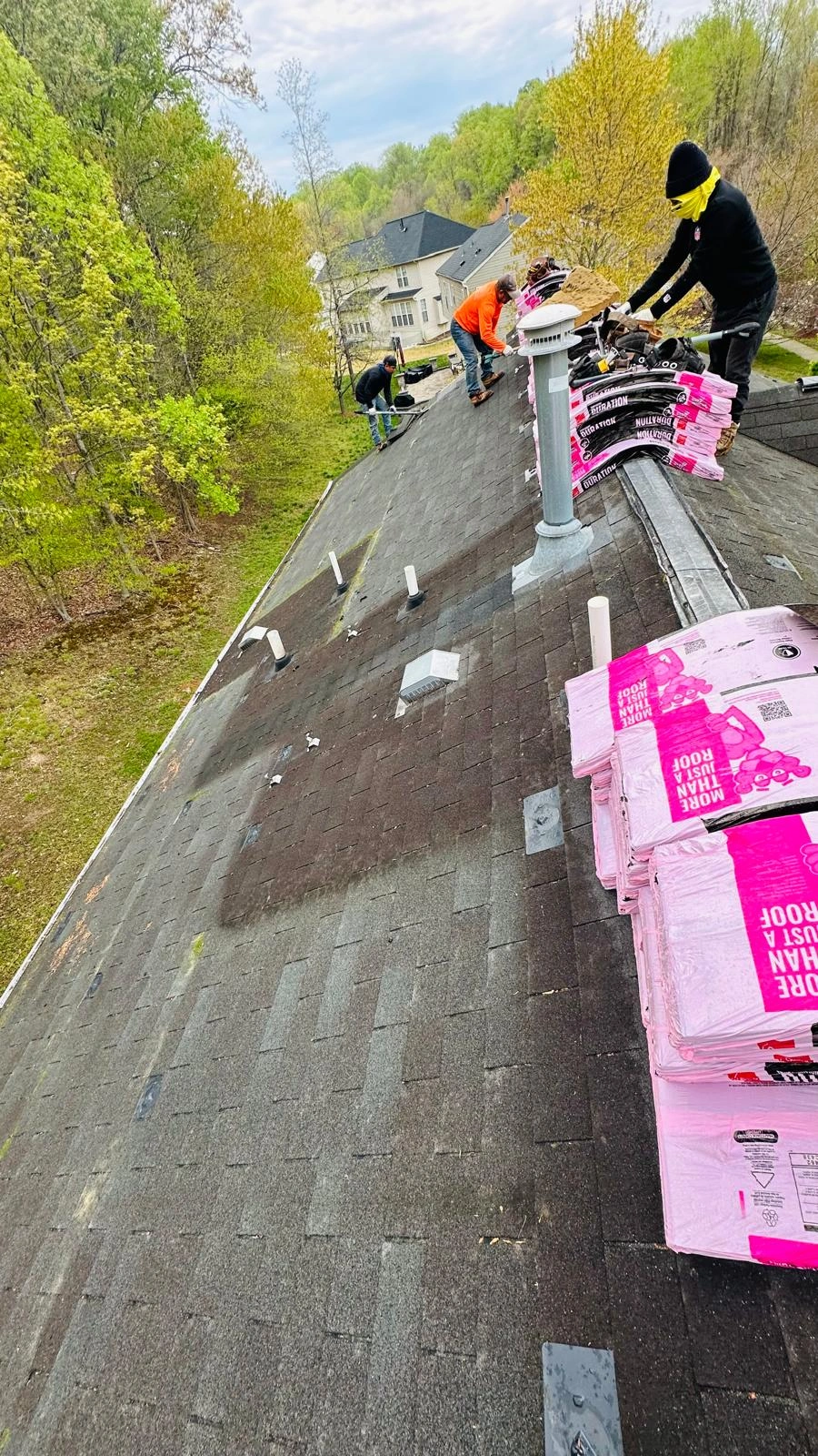 Hail damaged roof before restoration