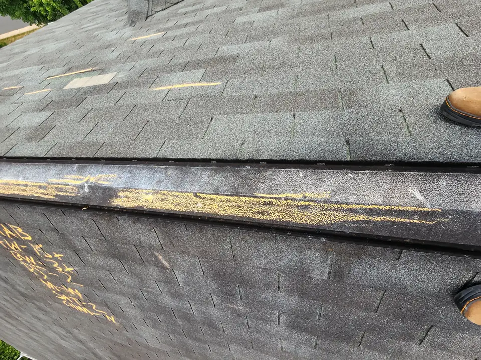 Worn roof before replacement in Woodbridge, VA