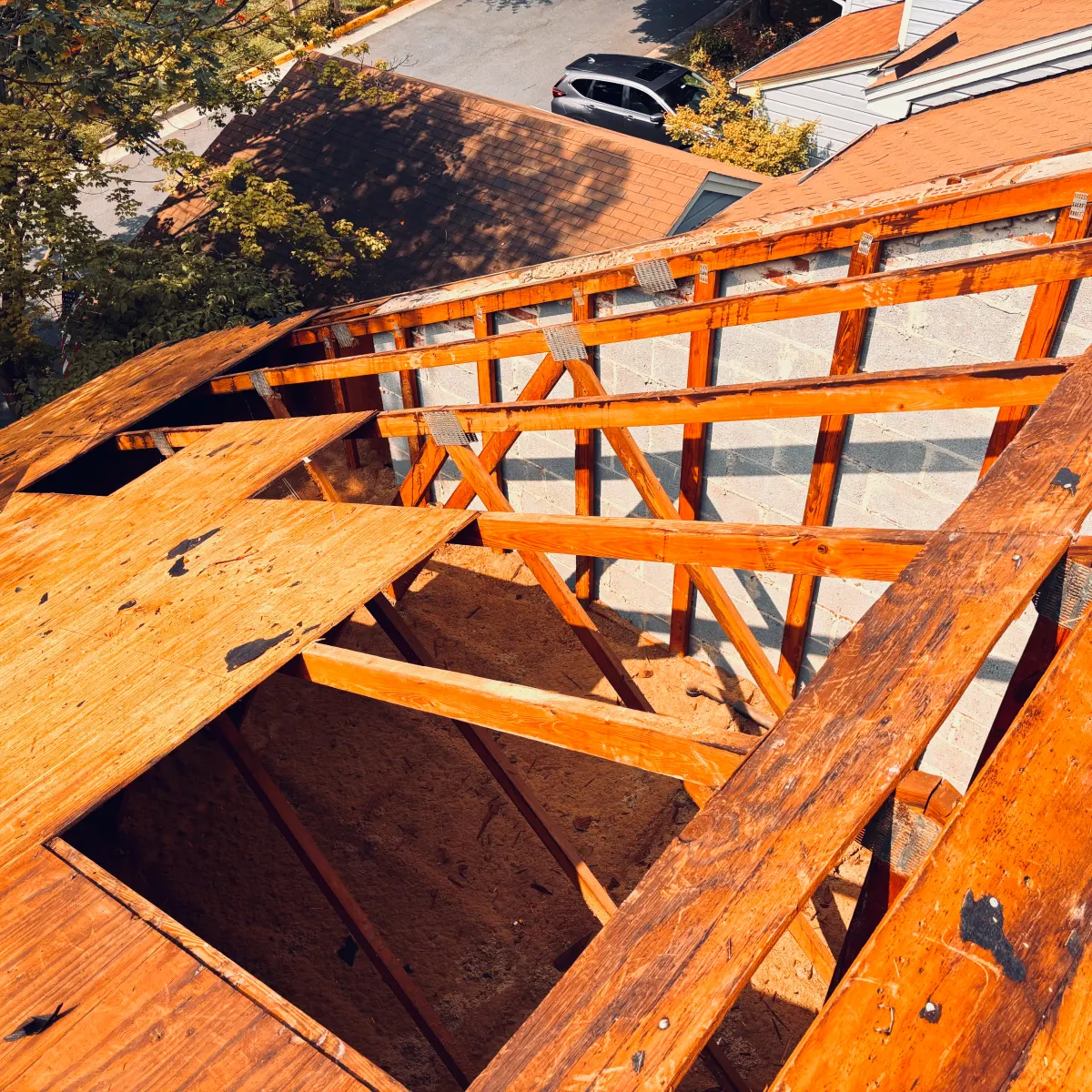 Roof framing rebuilt and braced before re-decking